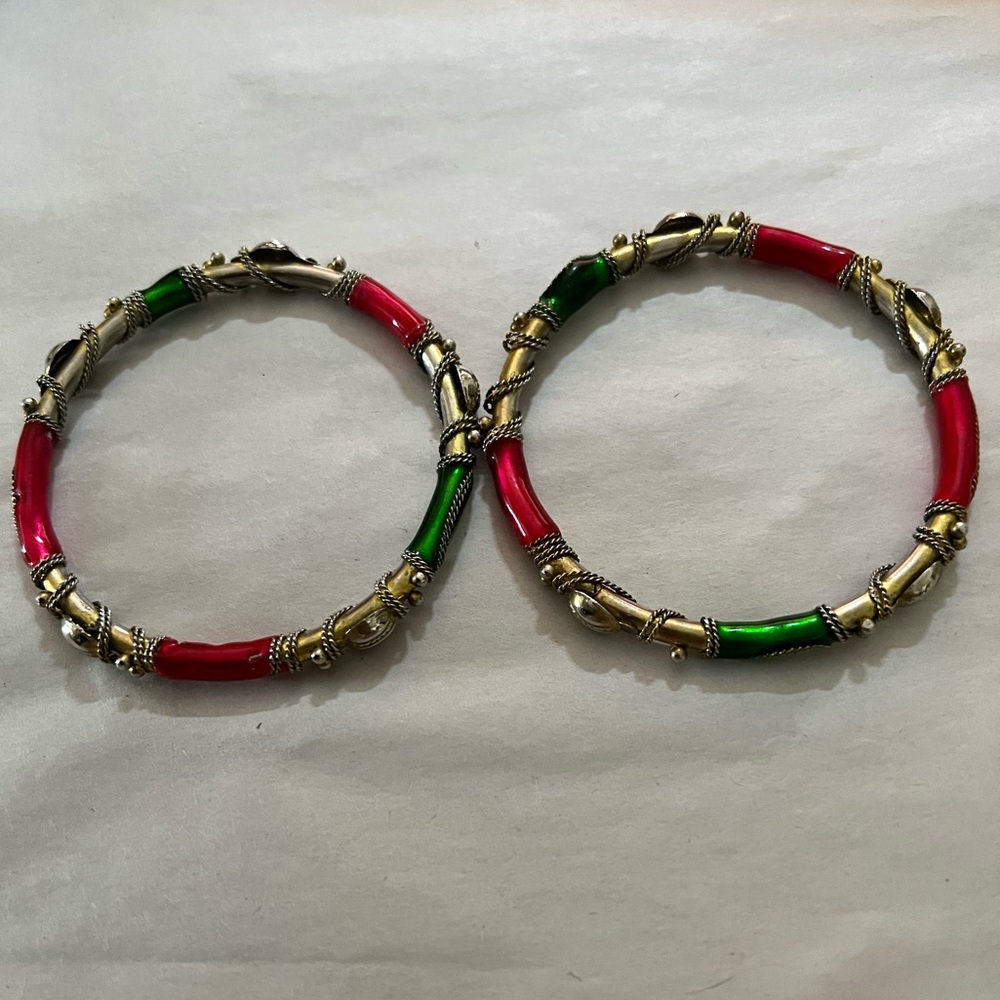 Goldtone with green and red enamel ornate bracelets. Rhinestones bangles 2.